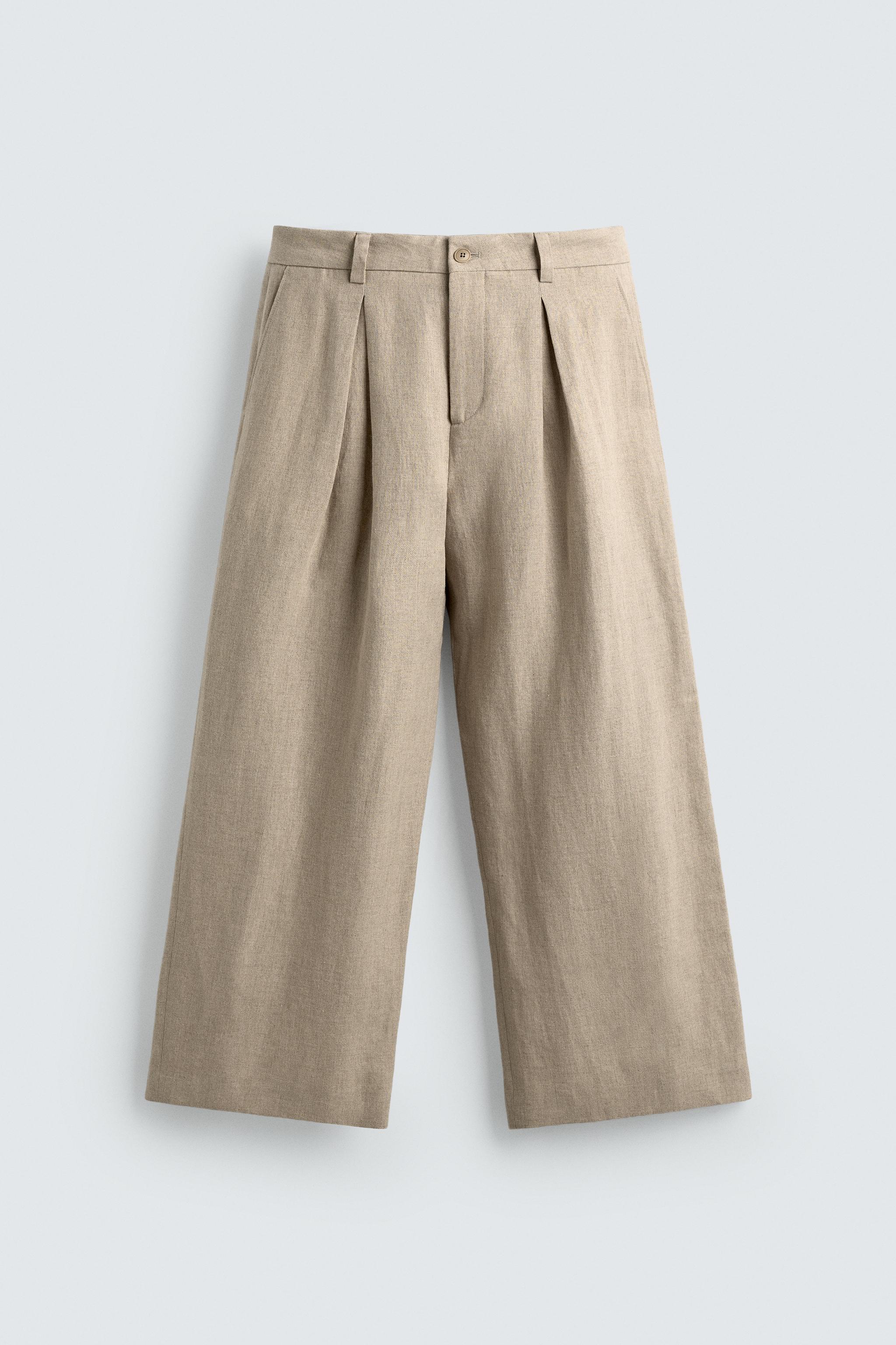 RELAXED FIT PLEATED SUIT PANTS